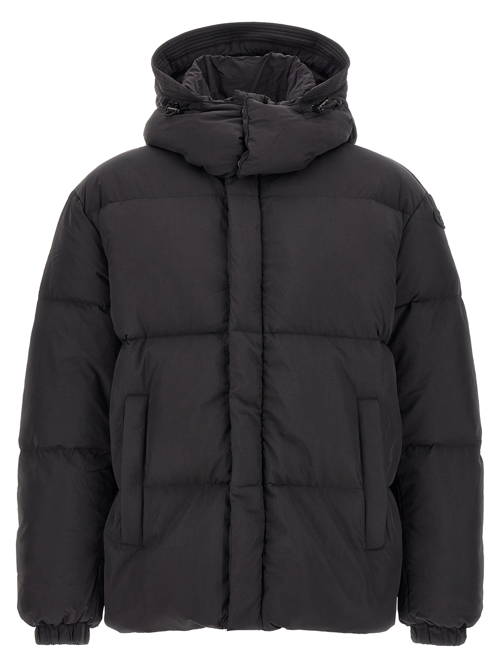 Veste longue Diesel en polyamide noir, coupe ajustée, avec fermeture éclair et col montant, style urbain et moderne.