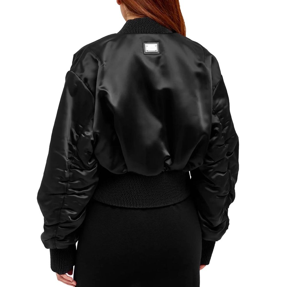Veste bomber noire en acétate de Dolce & Gabbana, style moderne et élégant, vue de face sur fond blanc.