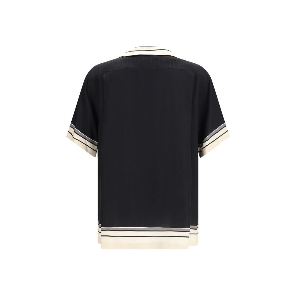 Chemise Dolce & Gabbana en soie multicolore à manches courtes, élégante et fluide, avec motif coloré.