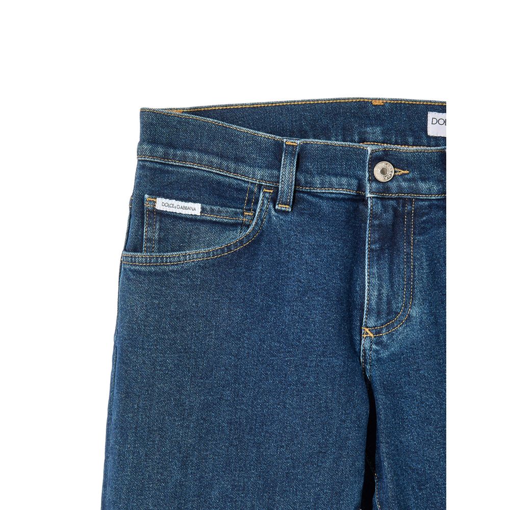 Jean skinny en coton bleu Dolce & Gabbana, ajusté, avec détails modernes, porté dans une image de style décontracté.
