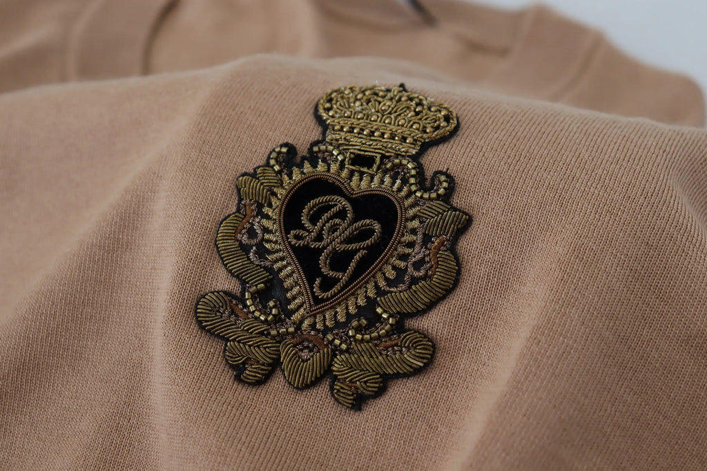 Dolce & gabbana beige pull en cachemire avec logo couronne brodé en or et design coeur sur le devant