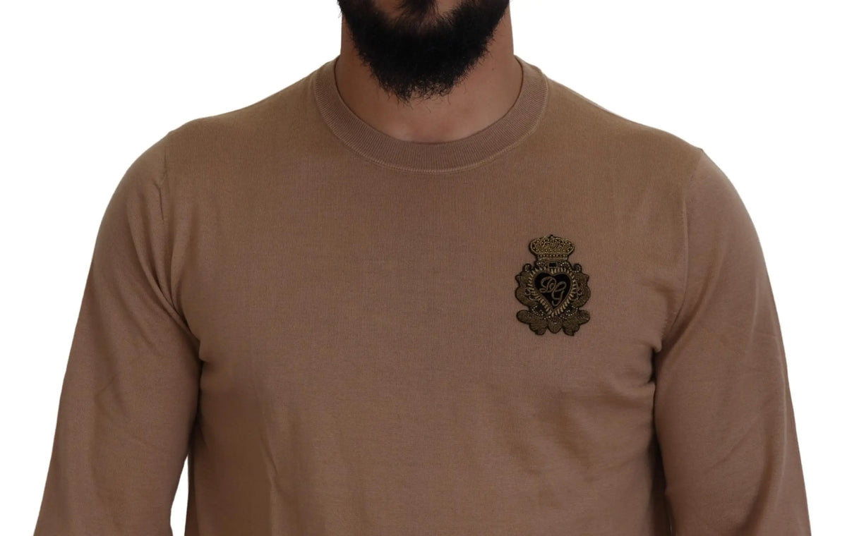 Dolce gabbana beige pull en cachemire à manches longues avec écusson brodé couronne et cœur sur la poitrine