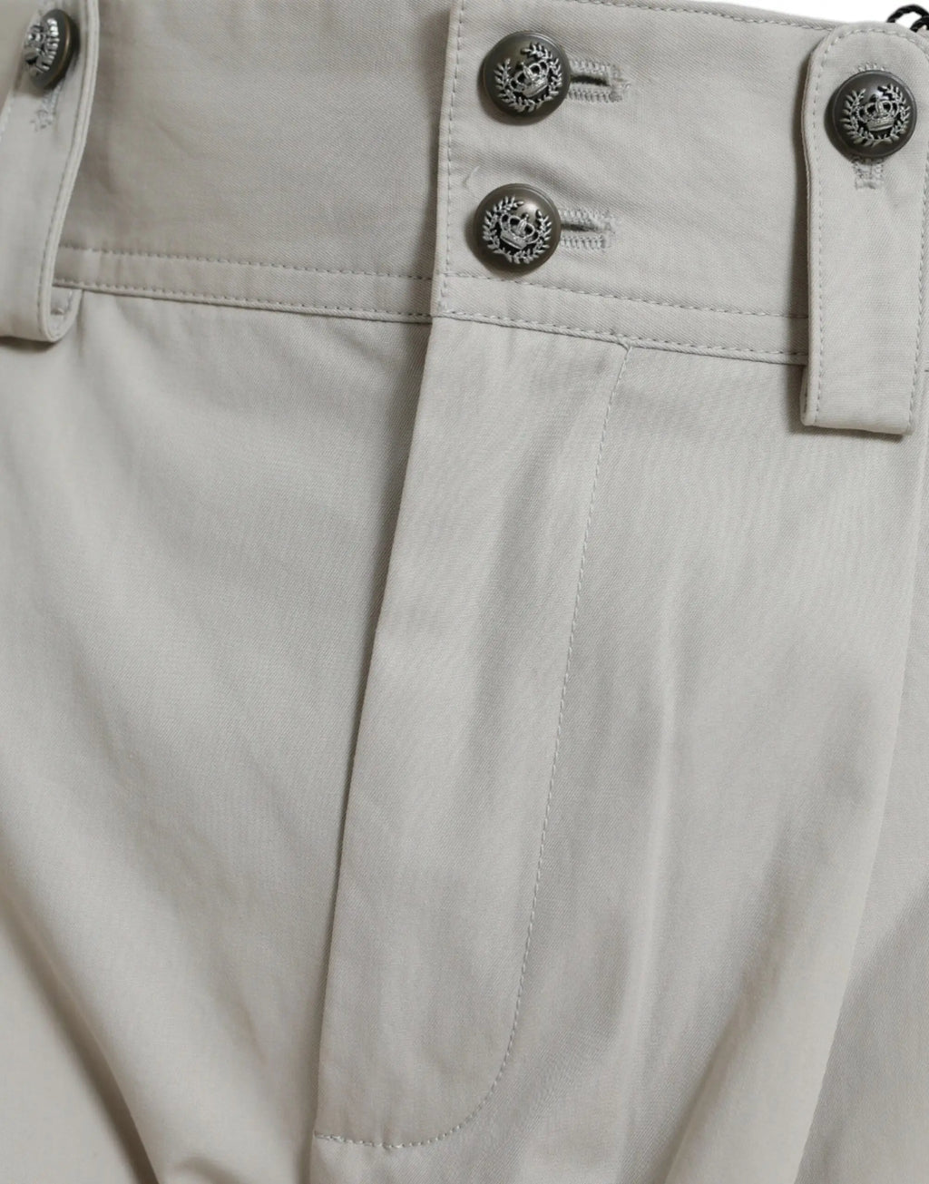 Pantalon beige en coton dolce & gabbana taille haute avec boutons argentés décoratifs en forme de feuilles de laurier
