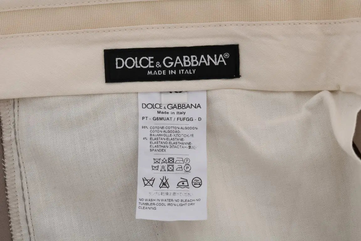 Pantalon chino beige dolce & gabbana en coton stretch avec étiquette noire de marque et étiquette d’entretien blanche
