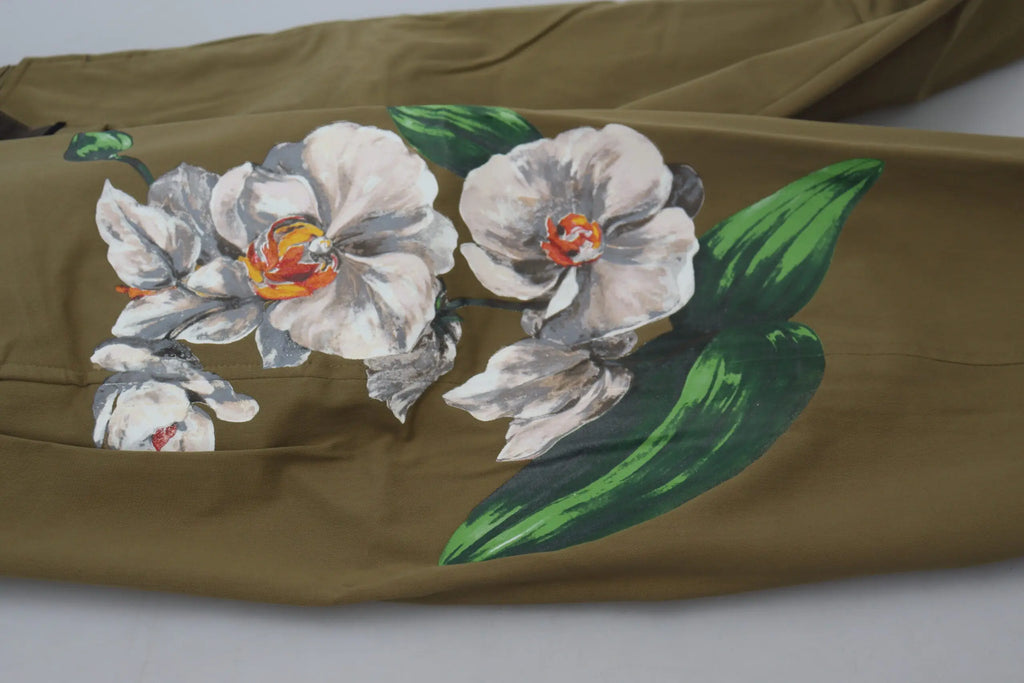 Pantalon chino beige en coton stretch dolce gabbana avec imprimé floral audacieux orchidées blanches et feuilles vertes