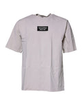 T-shirt col rond beige dolce & gabbana en coton avec patch noir et texte blanc only good vibes milano 1984