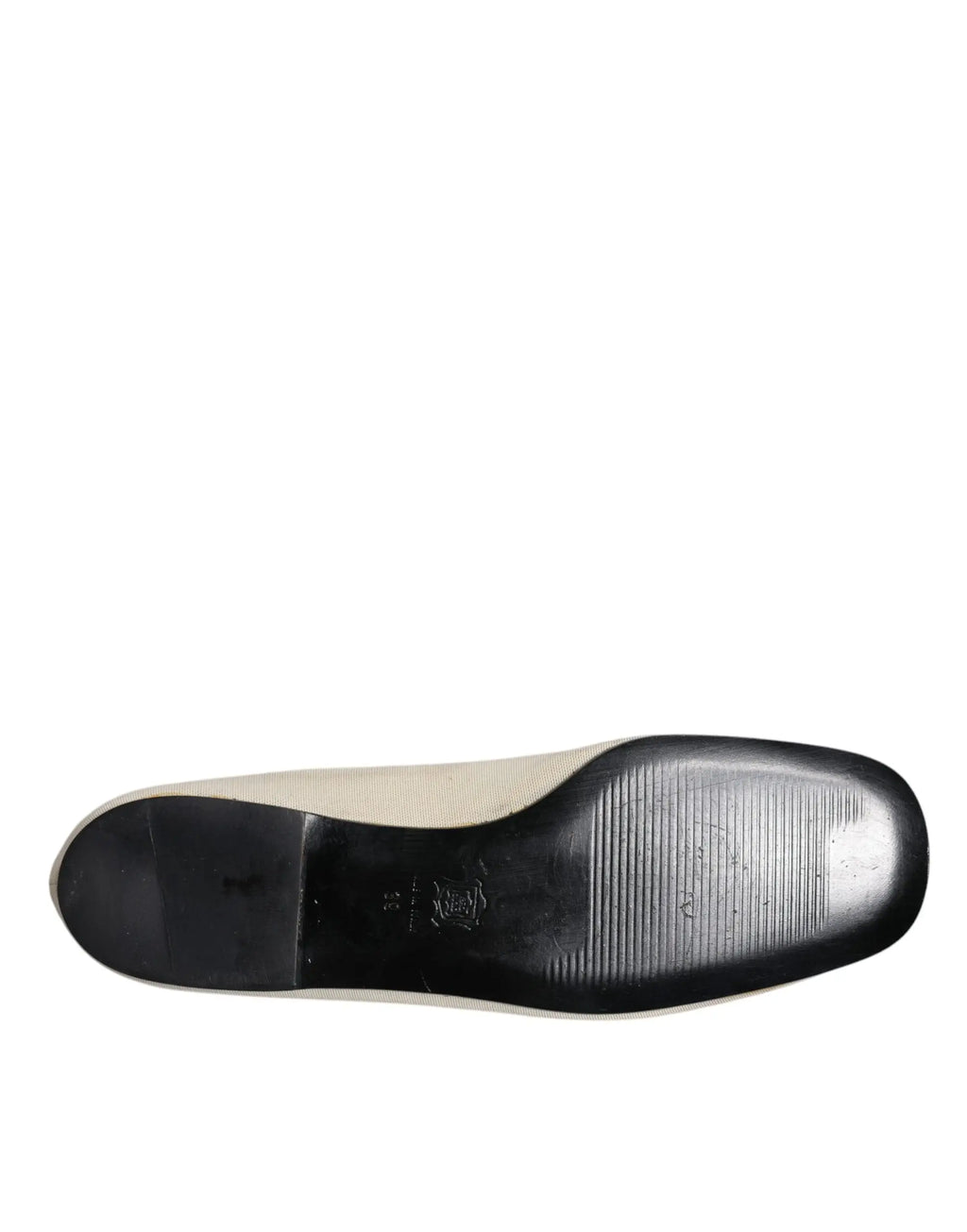 Chaussure plate beige en toile dolce & gabbana avec semelle en caoutchouc noir et motif texturé subtil