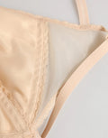 Soutien-gorge doux triangle en nylon beige dolce gabbana avec finition en dentelle délicate et bretelles réglables