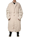 Dolce & gabbana beige trench coat oversized matelassé avec fermeture à boutons et col rembourré