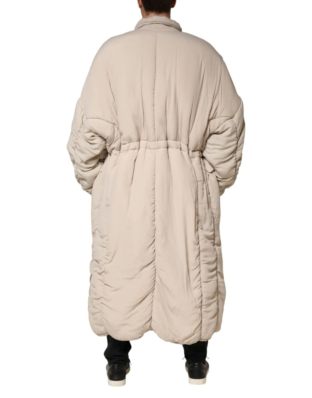 Dolce & gabbana beige puffer coat with cinched waist and voluminous sleeves in padded long trench style