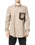 Chemise beige dolce & gabbana manches longues avec poche noire illustrée dune femme vintage sur lune en croissant