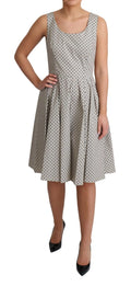 Robe sans manches dolce & gabbana beige à pois noirs en coton légère et évasée au genou