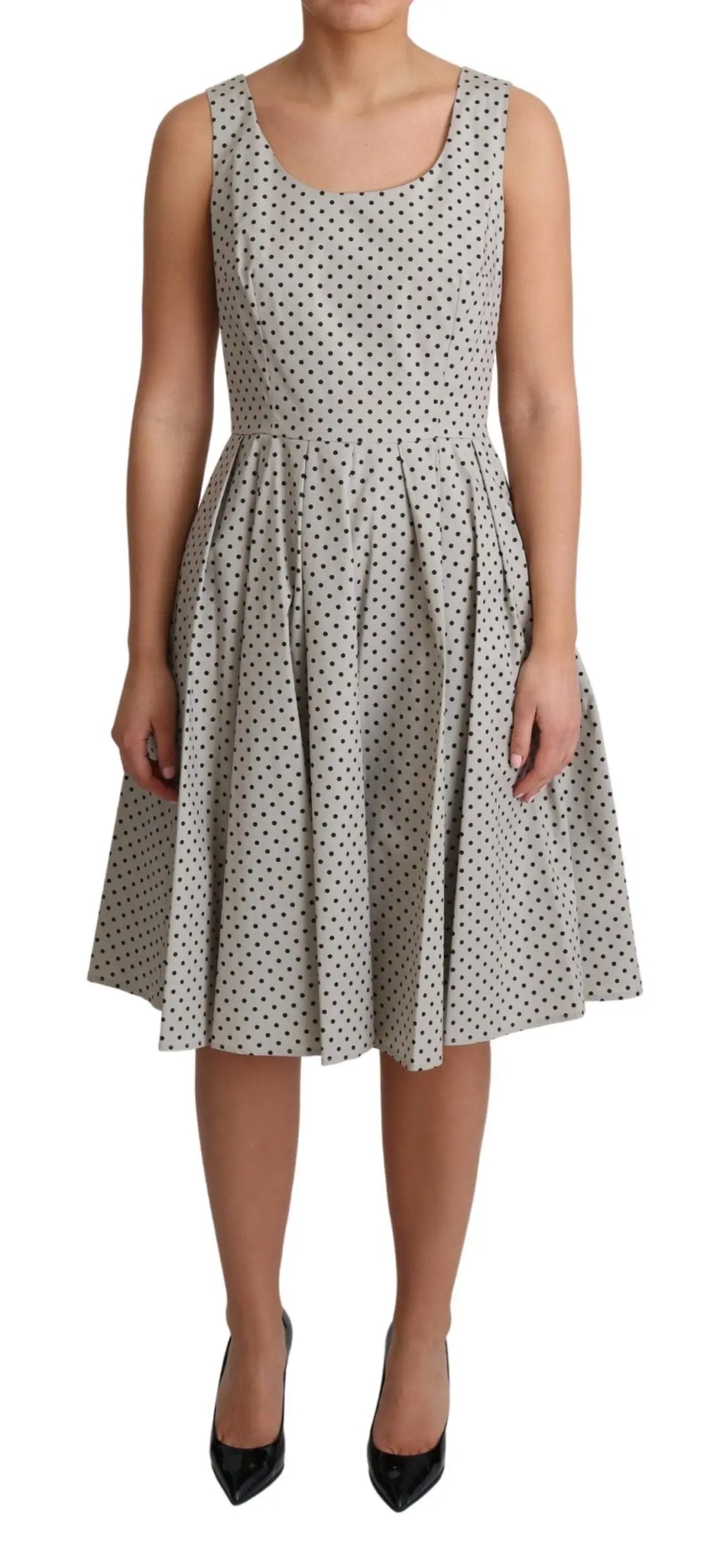 Robe dallas beige à pois noirs en coton a ligne sans manches longueur genoux par dolce & gabbana