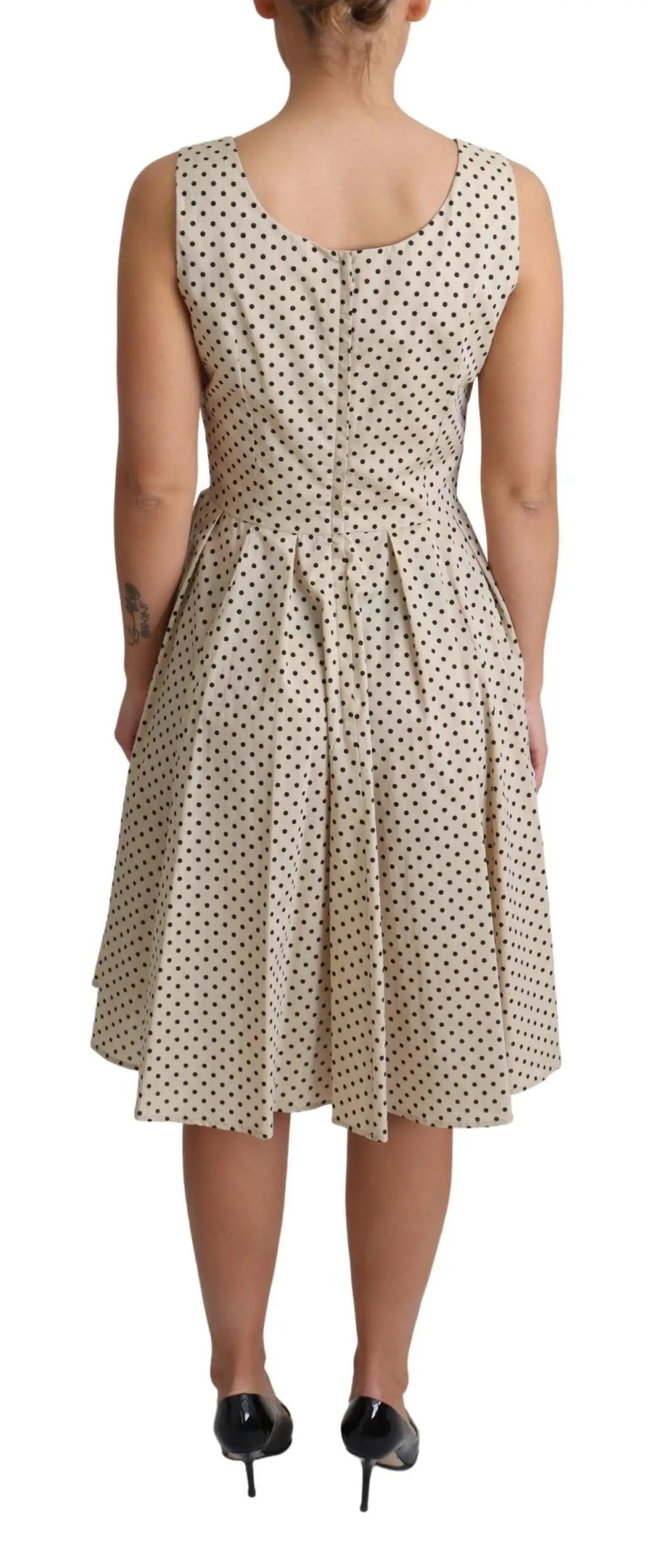 Robe beige à pois dolce & gabbana en coton avec corsage ajusté et jupe évasée sans manches