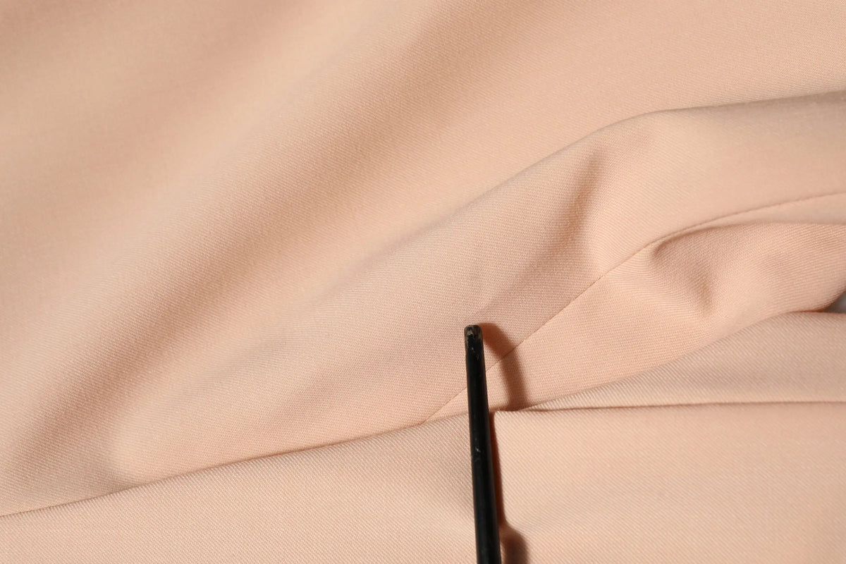 Pantalon tapered beige dolce & gabbana en polyester au toucher tissé doux avec un léger éclat