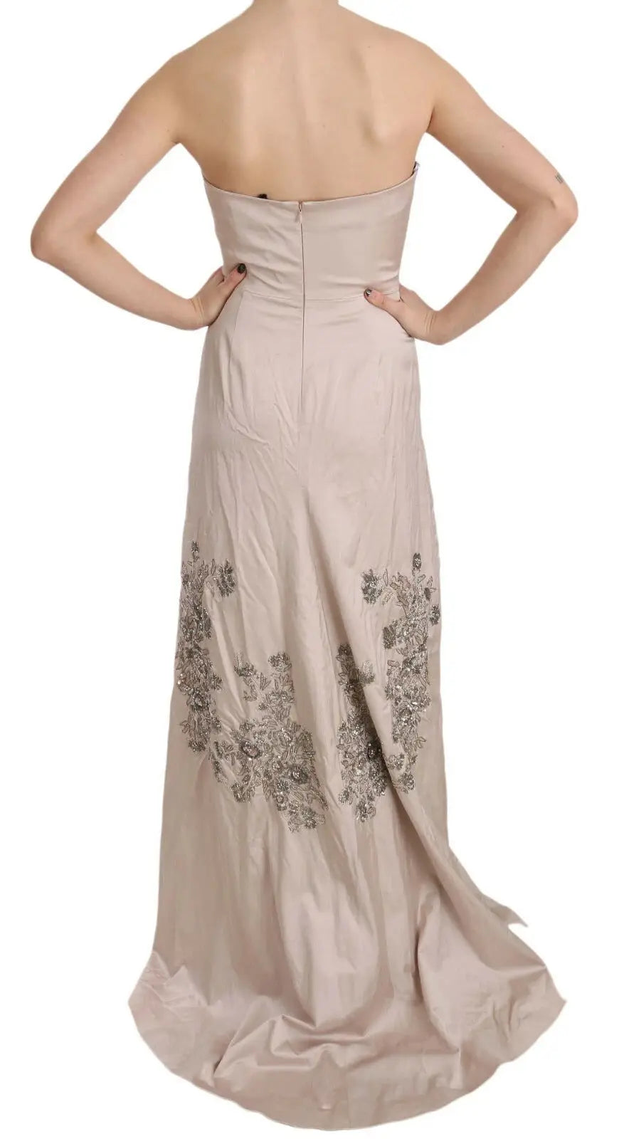 Vue arrière d’une robe longue bustier beige dolce & gabbana en satin avec broderie florale argentée au dos inférieur
