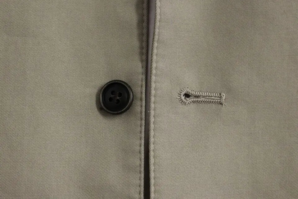 Bouton noir quatre trous sur tissu beige de la veste formelle en mélange de soie dolce gabbana