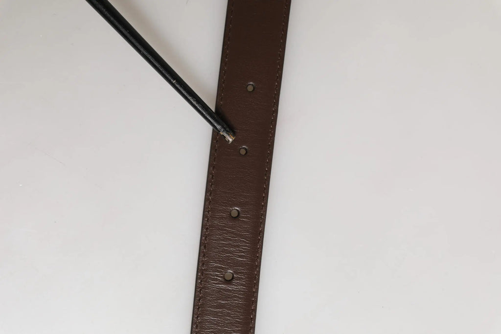 Ceinture dolce & gabbana pour homme en cuir marron avec œillets métalliques et coutures visibles sur les bords