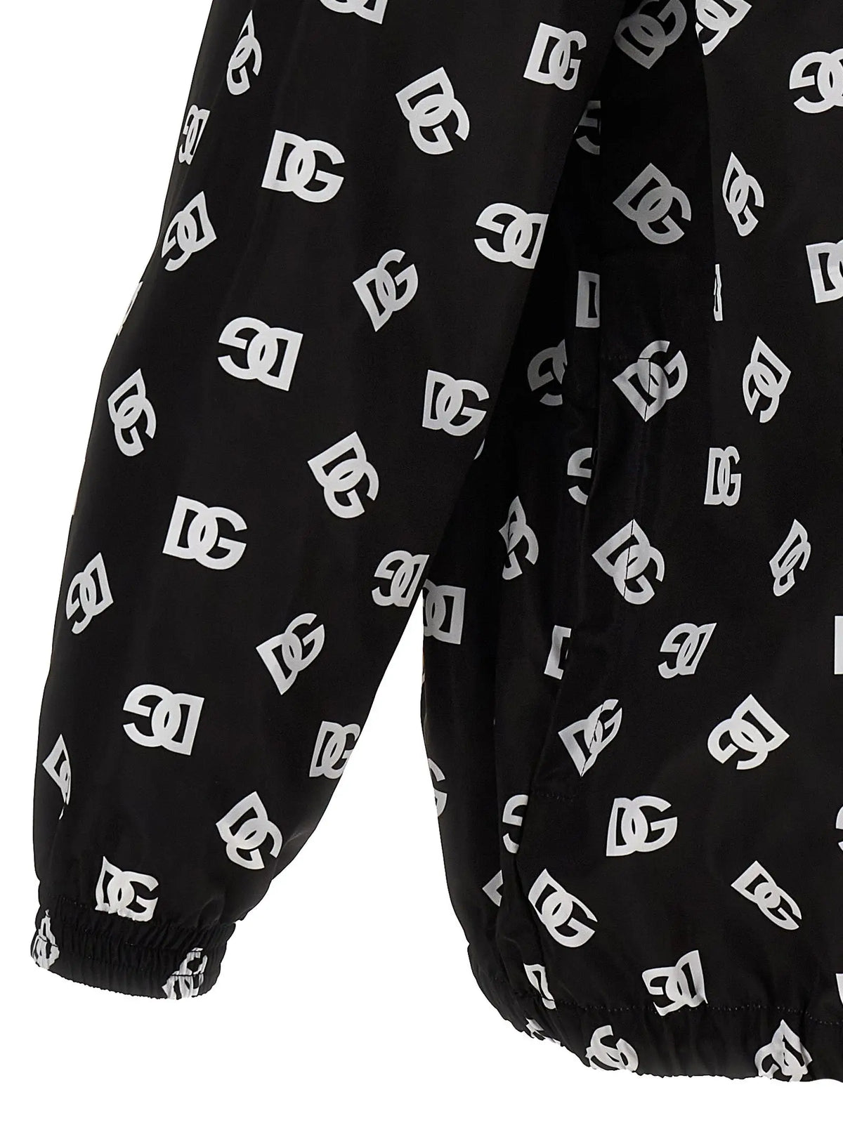Pantalon de survêtement noir dc avec logo imprimé blanc répétitif associé à une veste coque bicolore en polyester dolce gabbana