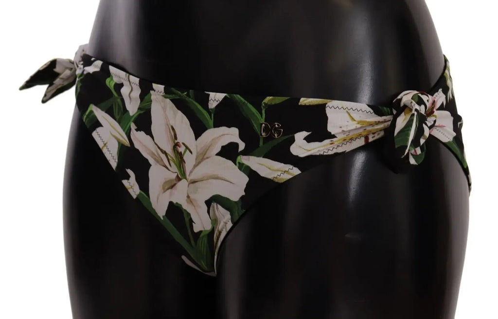 Dolce & gabbana bikini bottom noir avec imprimé lys blanc et feuilles vertes et liens noués sur les côtés