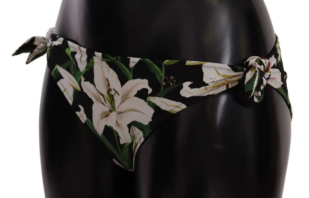 Dolce & gabbana bikini bottom noir avec imprimé lys blanc et feuilles vertes et liens noués sur les côtés