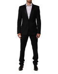 Dolce & gabbana veste noire 2 boutons en tissu façonné avec revers crantés et coupe croisée élégante