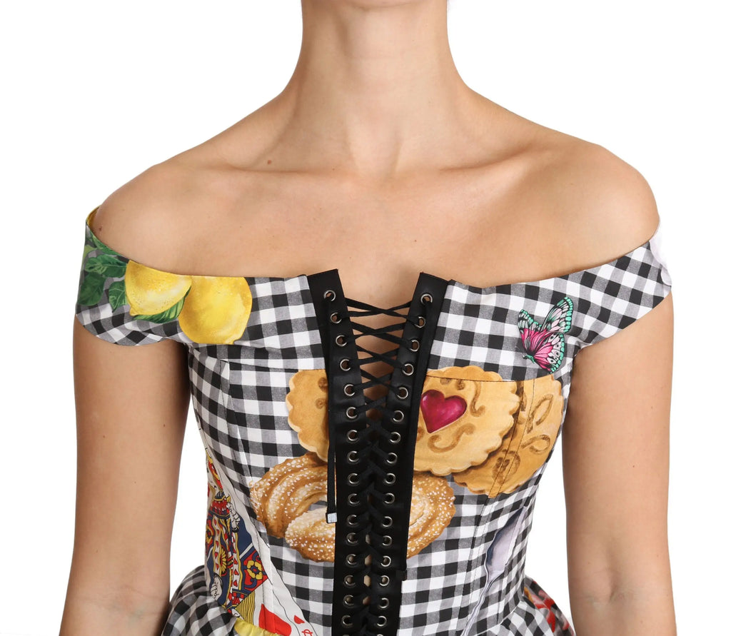 Blouse corset dolce & gabbana noire et blanche avec imprimés citron et cookies et laçage devant