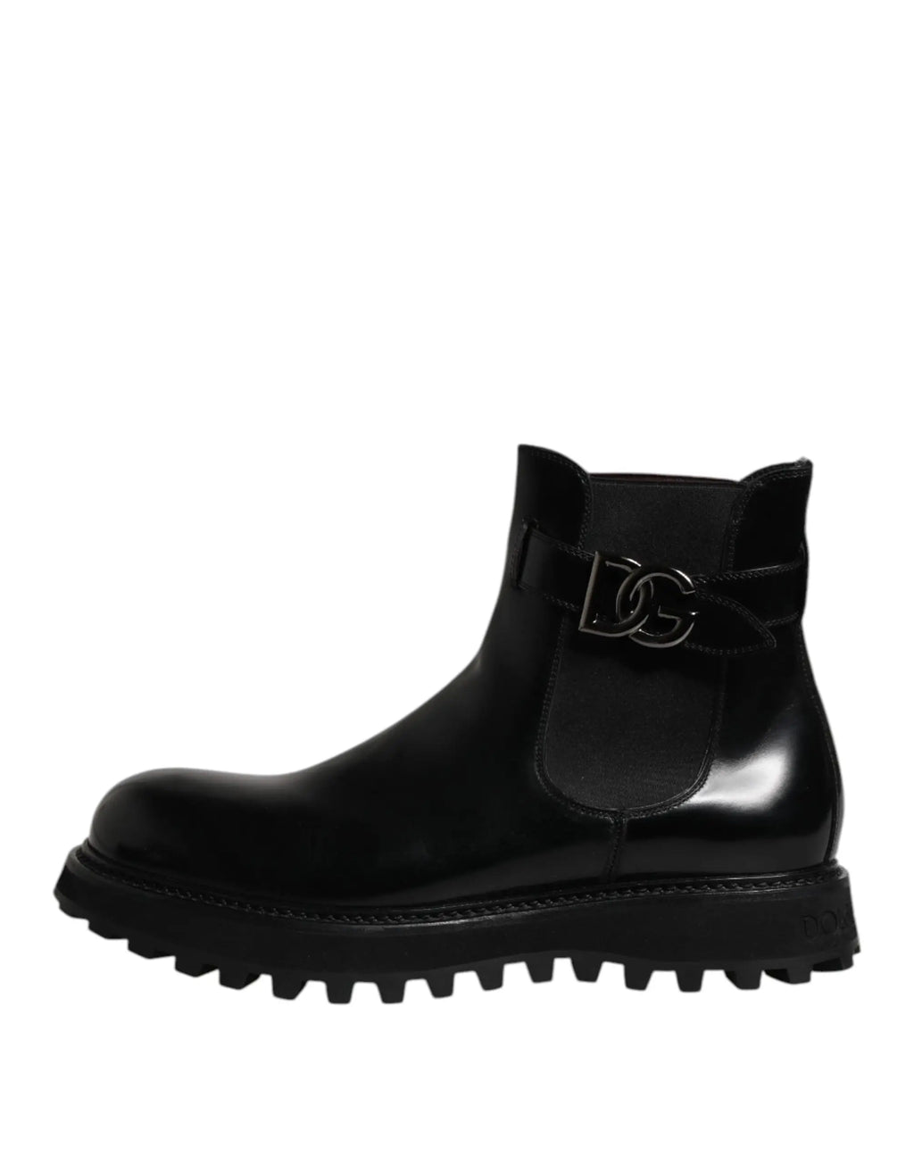 Bottines chelsea pour homme dolce gabbana en cuir noir brillant avec boucle logo dg argentée et semelle texturée robuste