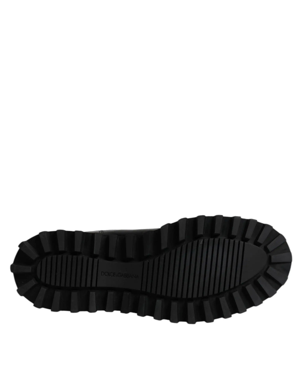 Semelle en caoutchouc noir avec motif de bande de roulement profond et logo dolce & gabbana embossé sur bottines chelsea homme