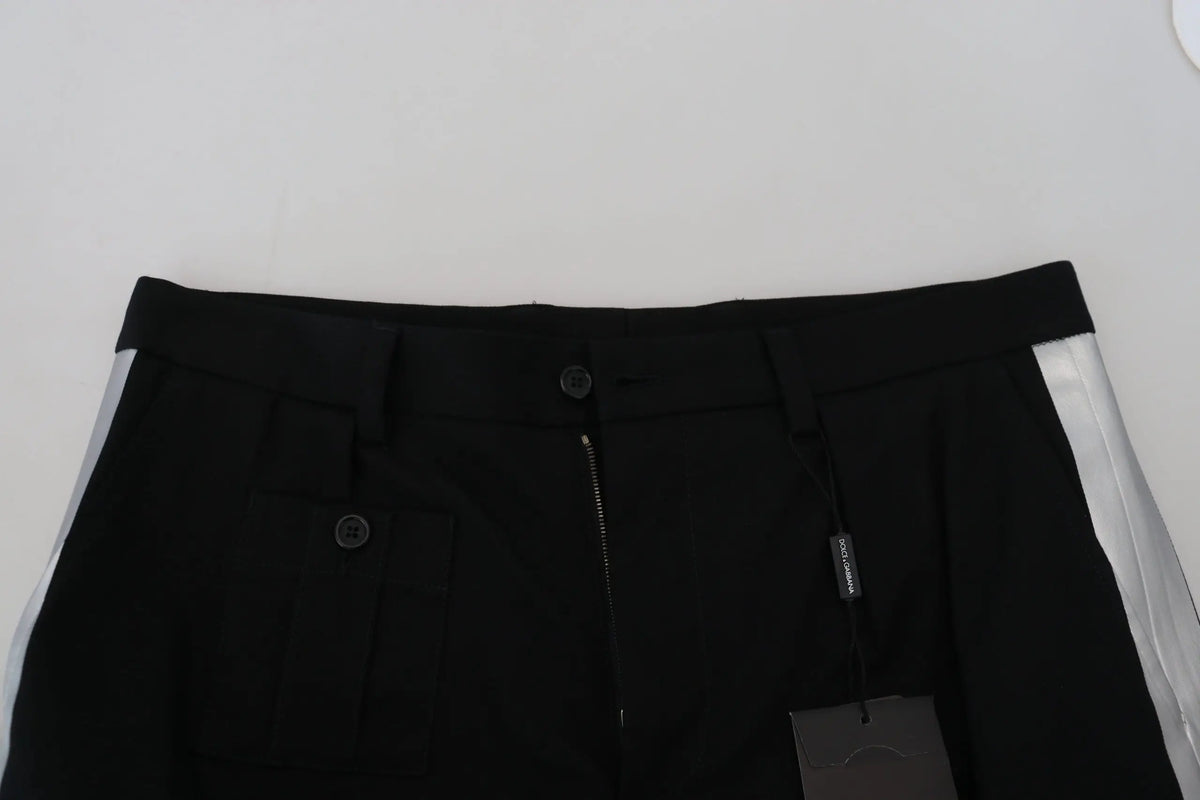 Dolce & gabbana black bermuda cargo shorts with silver side stripes and branded tag for casual wear