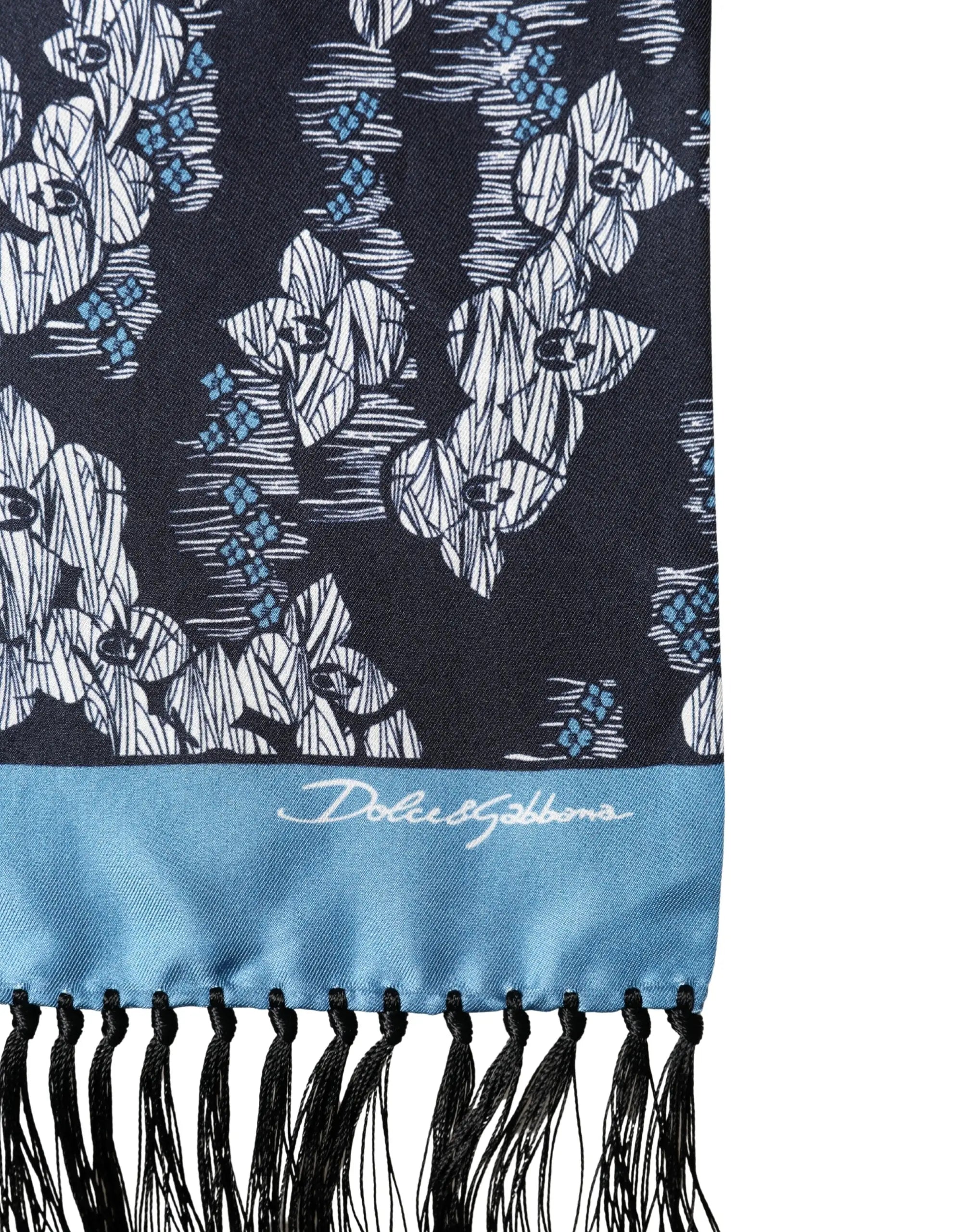 Foulard en soie bleu marine dolce & gabbana avec motif floral blanc et bleu clair et franges noires 140cm x 16cm