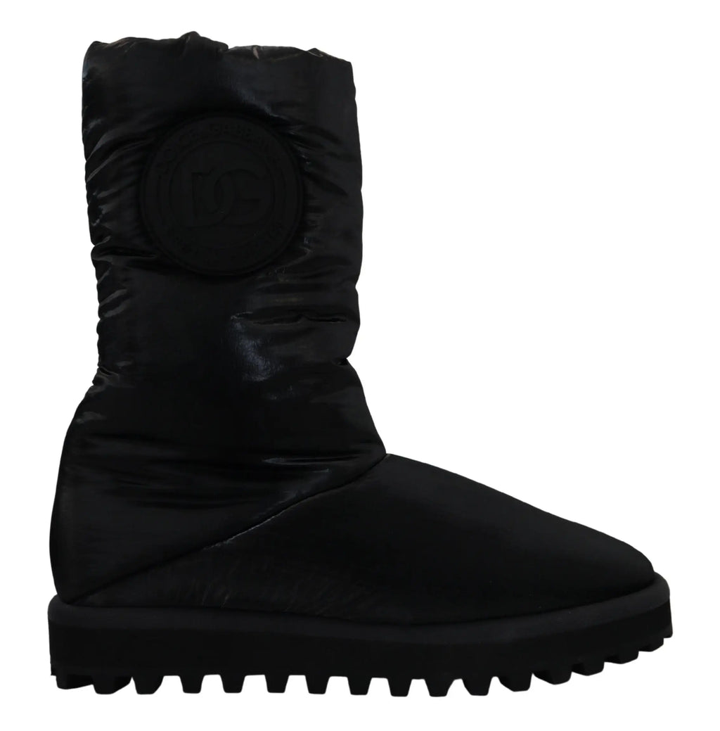 Bottes noires dolce & gabbana en matière matelassée avec semelle en caoutchouc texturée pour l’hiver