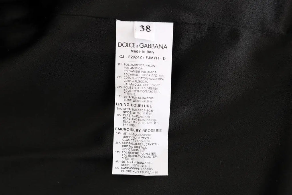 Étiquette noire dolce gabbana en tissu brocart blanc du blazer veste indiquant la composition et le soin
