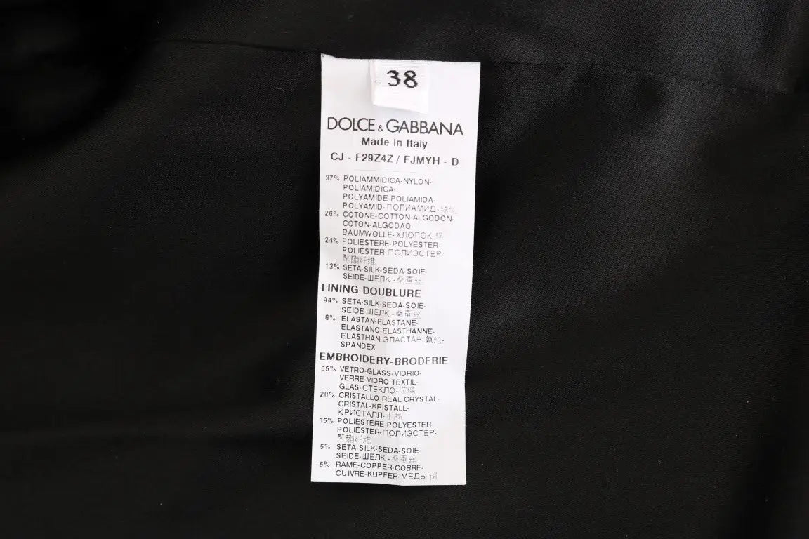 Étiquette noire dolce gabbana en tissu brocart blanc du blazer veste indiquant la composition et le soin
