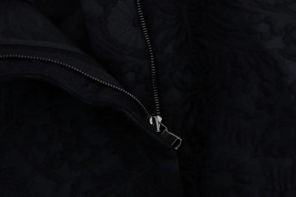 Veste noire dolce & gabbana avec fermeture éclair argentée et tissu texturé