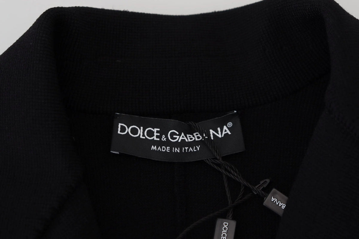 Étiquette noire dolce & gabbana avec lettrage blanc et inscription made in italy sur cardigan blazer noir en viscose