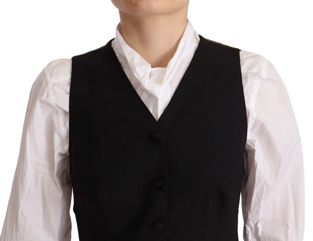 Gilet noir sans manches dolce & gabbana en viscose avec col en v et trois boutons porté sur chemise blanche colée