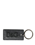 Clé porte-clés dolce & gabbana en cuir de veau noir texturé avec logo d&g embossé et anneau métal argenté