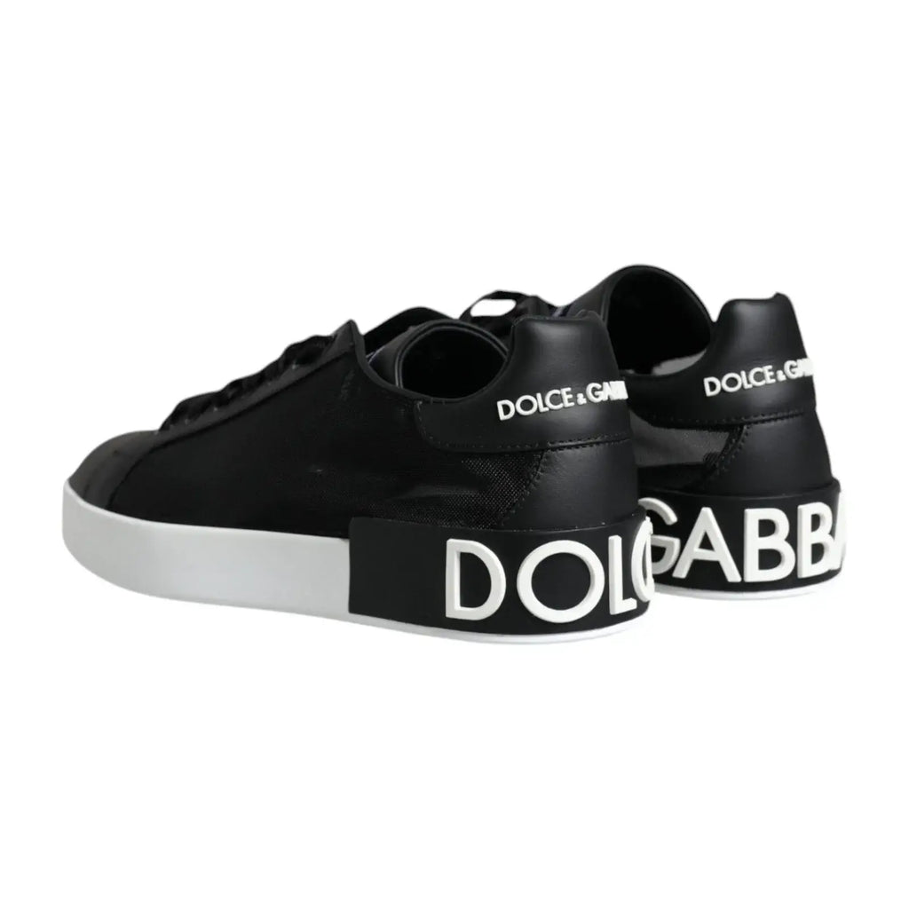 Vue arrière des baskets portofino dolce & gabbana noires en cuir de veau avec semelles blanches et lettrage blanc audacieux