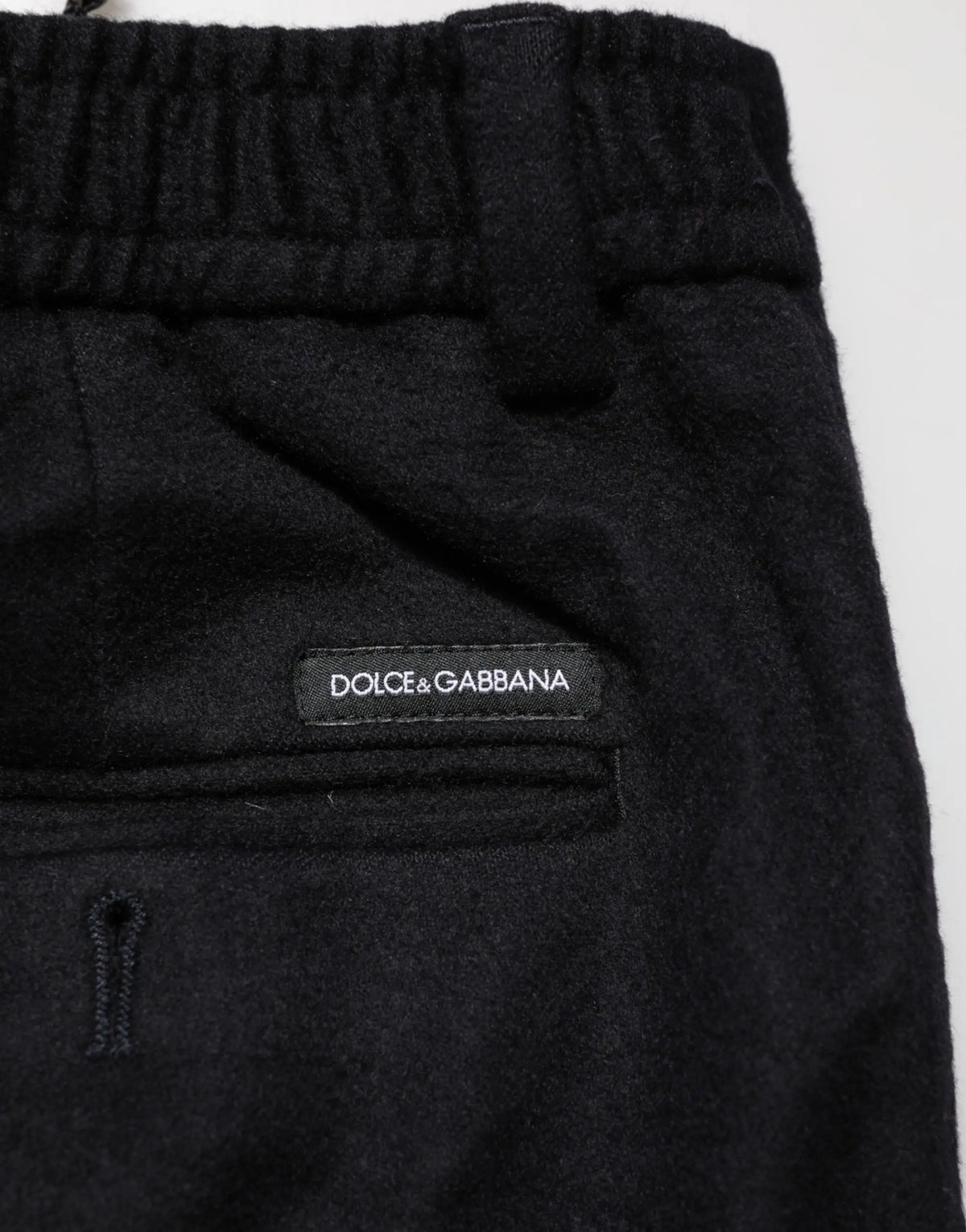 Dolce & gabbana noir pantalon habillé en cachemire avec taille élastique en laine mélangée et étiquette de marque