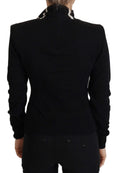 Pull noir dolce & gabbana en cachemire à col roulé avec bordure blanche et noire distinctive