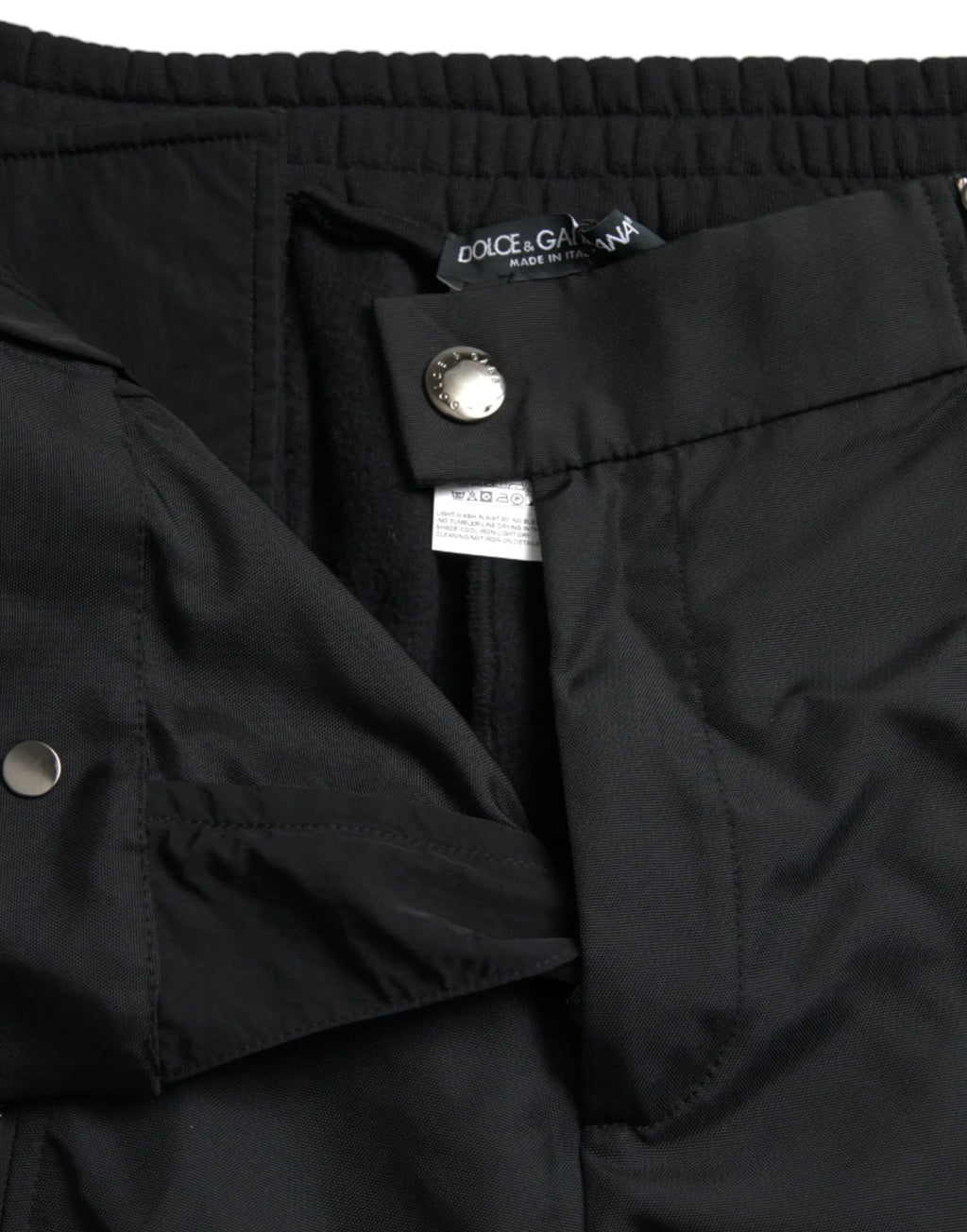 Pantalon skinny dolce & gabbana noir en mélange de coton avec design structuré et boutons métalliques élégants