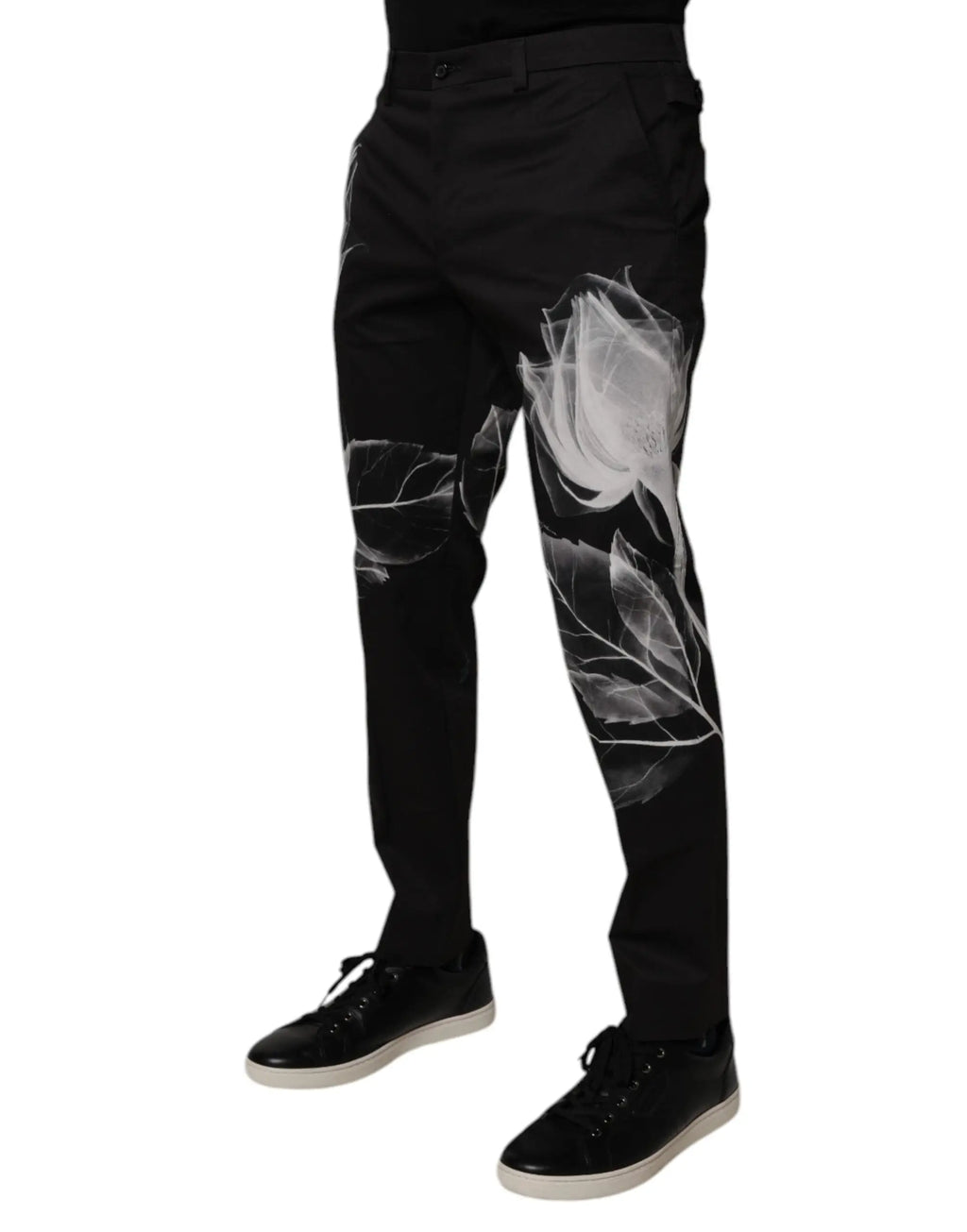 Pantalon slim en coton noir dolce gabbana avec motif floral blanc et motifs translucides de roses et feuilles le long des jambes