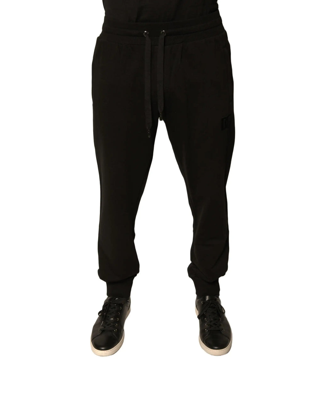 Dolce & gabbana joggers noirs en coton pour homme avec taille à cordon et poignets côtelés