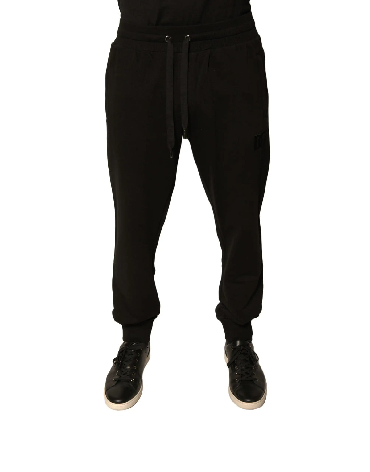 Dolce & gabbana joggers noirs en coton pour homme avec taille à cordon et poignets côtelés