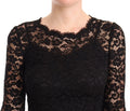 Robe sirène noire en dentelle de coton avec manches longues et motifs floraux de Dolce & Gabbana