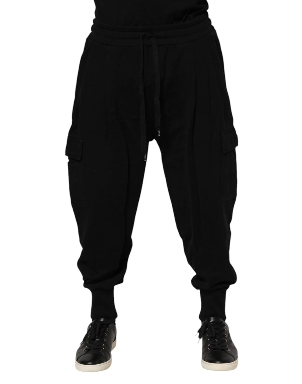Black cotton dolce & gabbana jogger sweatpants with elastic waistband, drawstring, large side pockets, and tapered ankles