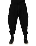 Black cotton dolce & gabbana jogger sweatpants with elastic waistband, drawstring, large side pockets, and tapered ankles