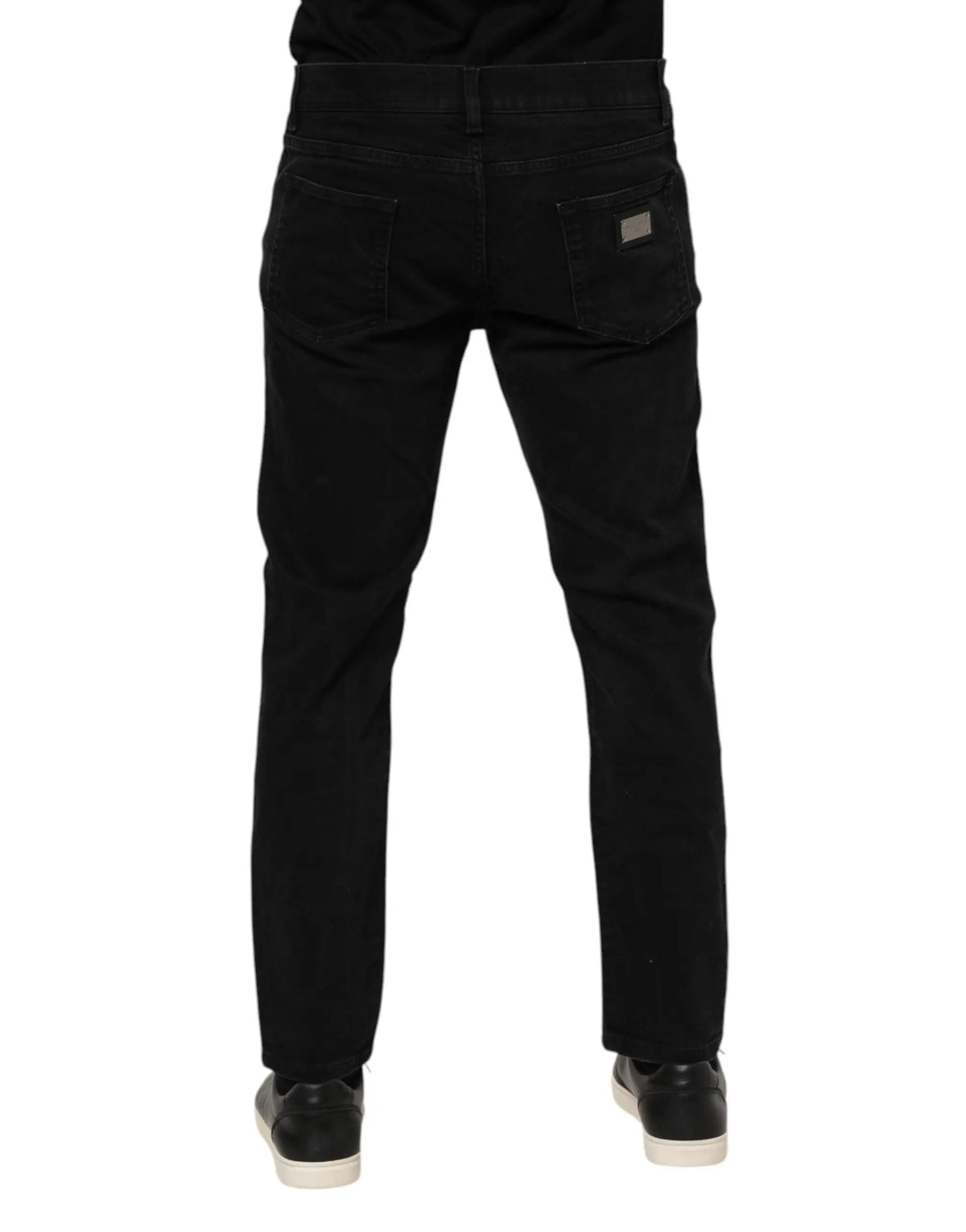 Jean denim noir dolce & gabbana en coton coupe slim vue de dos avec patch logo rectangulaire sur la poche arrière droite