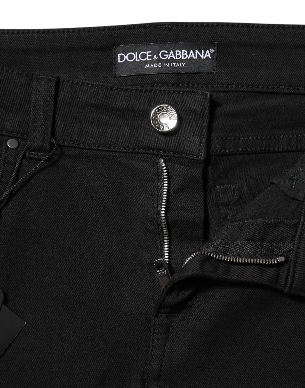 Jean skinny mi taille en denim noir en coton dolce gabbana avec bouton argenté et étiquette de marque visible